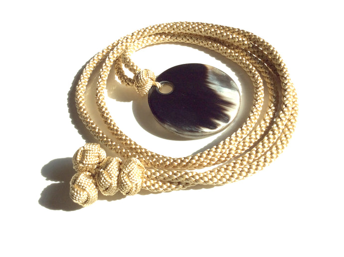 Minimalist ,adjustable,long golden color silk necklace.
