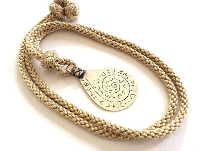 Long beige silk necklace ,metal pendant,berber alphabet engraved.